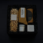 Thinking of You gift box with cozy socks, organic tea, caramel popcorn, oat soap, and candle – Canadian artisan gift by Muse Baskets & Co.