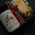 Teacher holiday gift box with hot chocolate truffle drops, chocolate pretzels, and mug.
