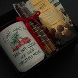 Teacher holiday gift box with hot chocolate truffle drops, chocolate pretzels, and mug.