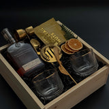 Elevated client appreciation gift box with bourbon, artisan pairings, and barware.