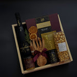 Noir Éclat holiday gift box with Freixenet cava, Canadian artisan treats, and keepsakes by Muse Baskets & Co