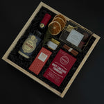 Dolce Notte holiday gift box with Masi Campofiorin red wine, chocolates, and festive accents.