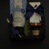 Sanctuary in Winter gift box with optional stoneware mug, artisan treats, and holiday accents in signature black packaging.
