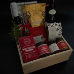Elegant wood box gift with wine, preserves, salmon, and artisan chocolates.