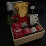 Elegant wood box gift with wine, preserves, salmon, and artisan chocolates.