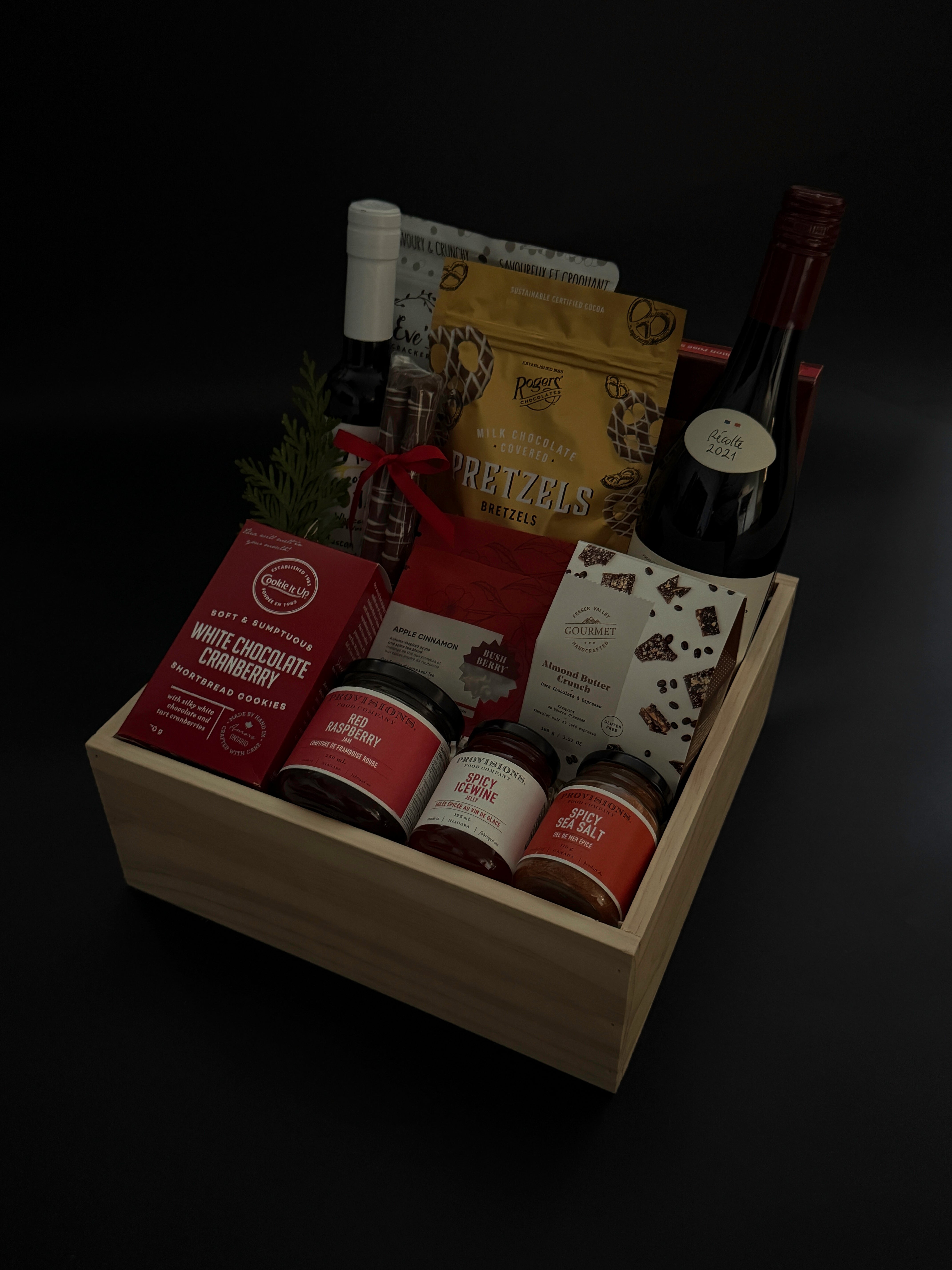 Holiday gourmet gift with wine, shortbread cookies, and Canadian artisan delicacies.