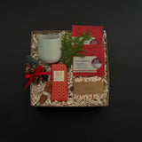 Client appreciation gift box featuring apple cinnamon tea, chocolate bar, and seasonal details.