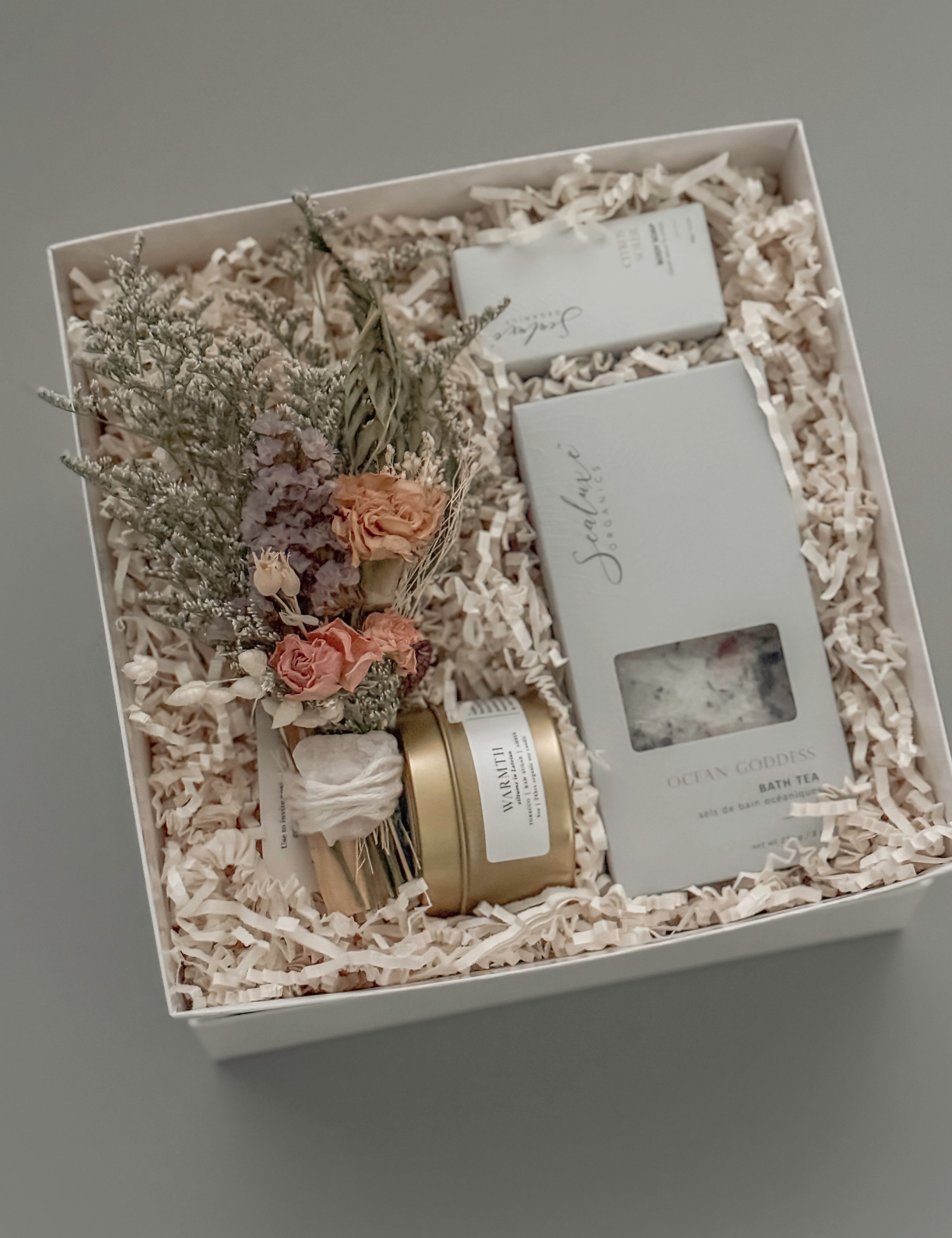 Thoughtfully curated gift box by Muse Baskets and Co., featuring dried florals, luxury candle, artisan soap, and Ocean Goddess bath tea — a perfect self-care or client appreciation gift.