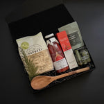 Close-up of Favuzzi artisanal pasta and passata bottles — showcasing premium Italian ingredients with refined labels.
