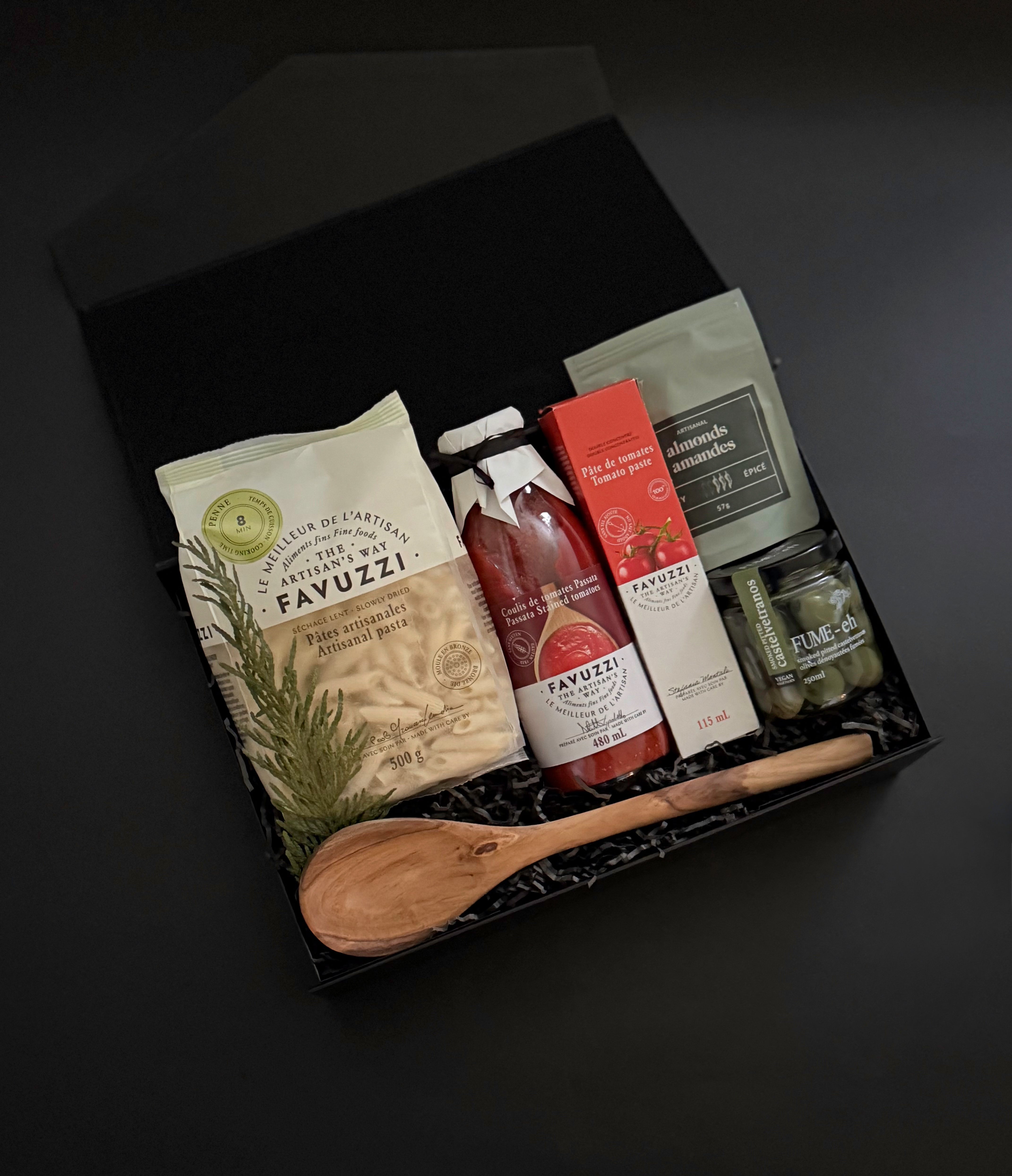 Close-up of Favuzzi artisanal pasta and passata bottles — showcasing premium Italian ingredients with refined labels.
