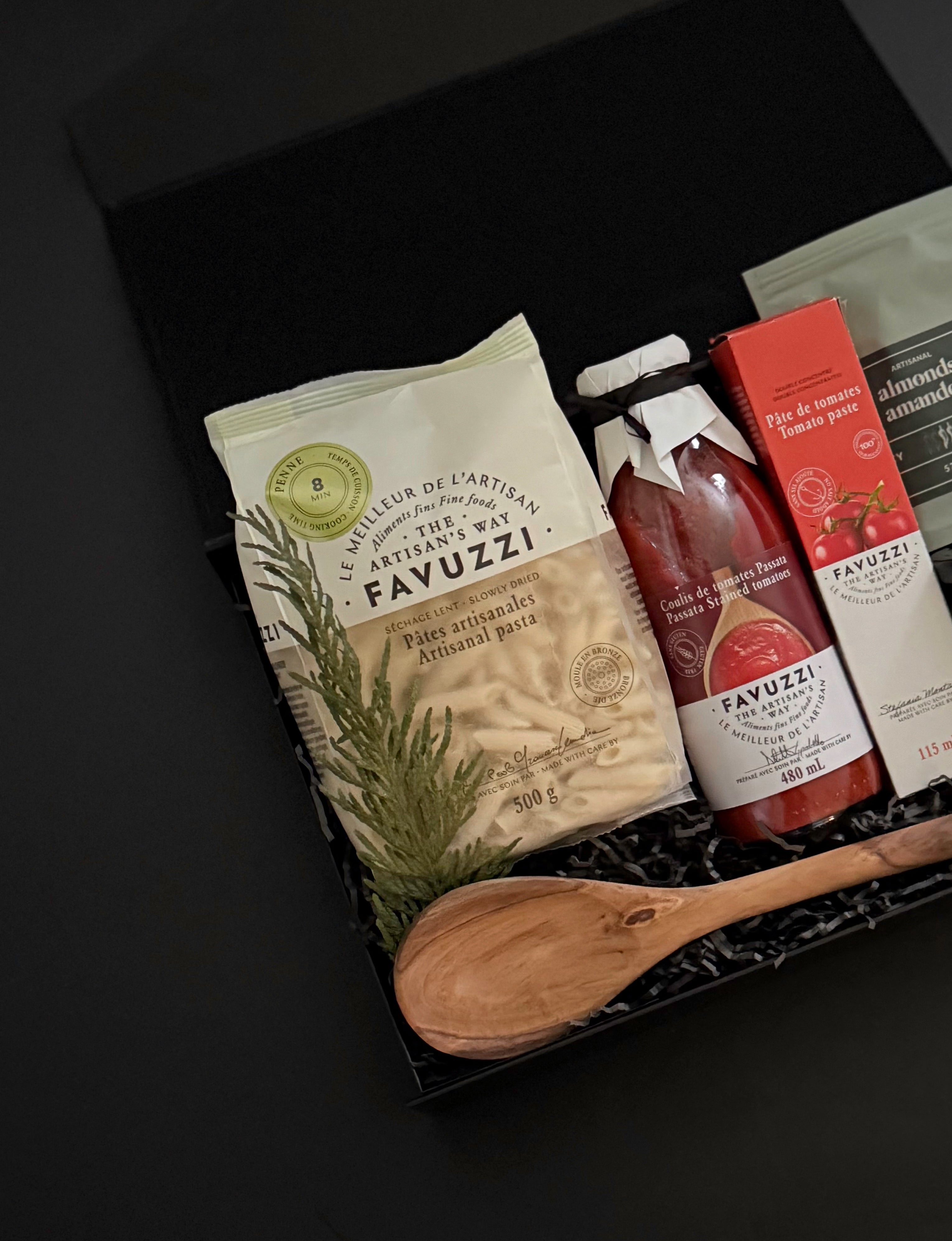 Favuzzi food products including a wooden spoon on a dark background