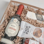 Luxury wine and cheese gift basket featuring Masi Campofiorin 2019, Castello brie, gourmet cashews, and artisanal red pepper jelly.