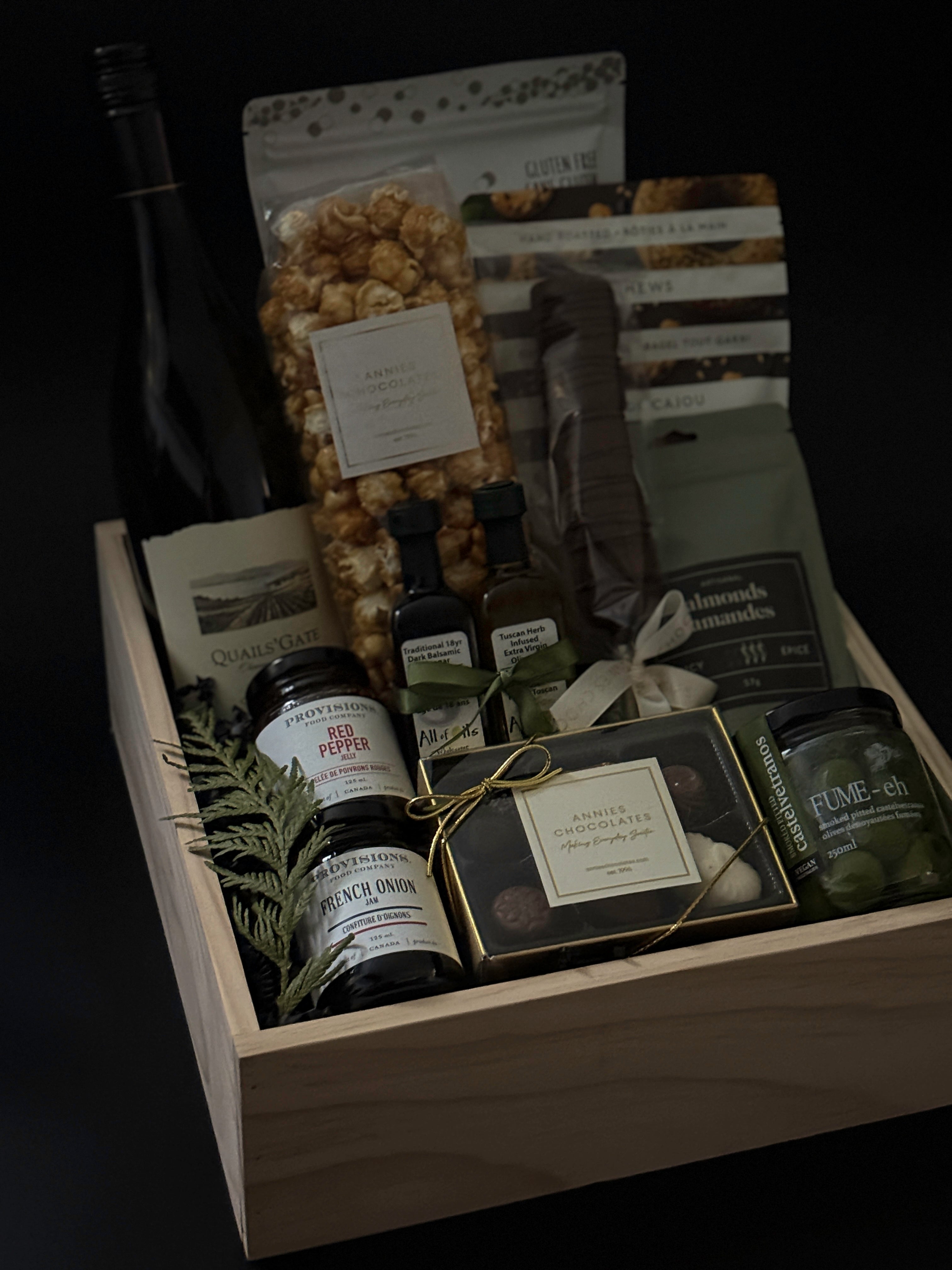 Elegant wood gift box from Muse Baskets and Co. wrapped with grosgrain ribbon and a handwritten notecard — refined packaging detail of The Opulent Collection luxury gift box