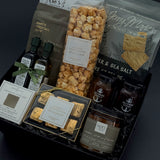 Luxury client closing and housewarming gift basket with Laurel Leaf & Olive candle, artisan preserves, and Canadian-made treats.