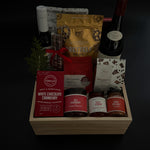 Luxury holiday gift box with French wine, savoury artisan foods, and gourmet confections.