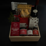 Luxury holiday gift box with French wine, savoury artisan foods, and gourmet confections.