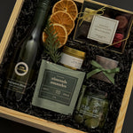 Corporate wine gift box with Kim Crawford Sauvignon Blanc, artisan foods, and festive accents.