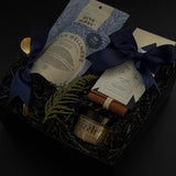 Luxury winter wellness gift box for corporate, client, and holiday gifting featuring artisan tea, chocolate, and seasonal details.