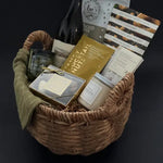 Grounded gift basket placed in a cozy living room setting for relaxation and self-care
