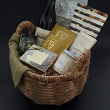 Grounded gift basket placed in a cozy living room setting for relaxation and self-care