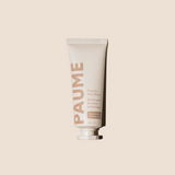 PAUME hand balm tube on a beige background