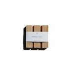 Aqua Studio bamboo tray for shower steamers, packaged with a white label, a self-care product featured in Muse Baskets and Co. gift baskets