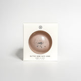 Aqua Studio Butter Bomb Bath Bomb packaging box, a self-care product featured in Muse Baskets and Co. gift baskets