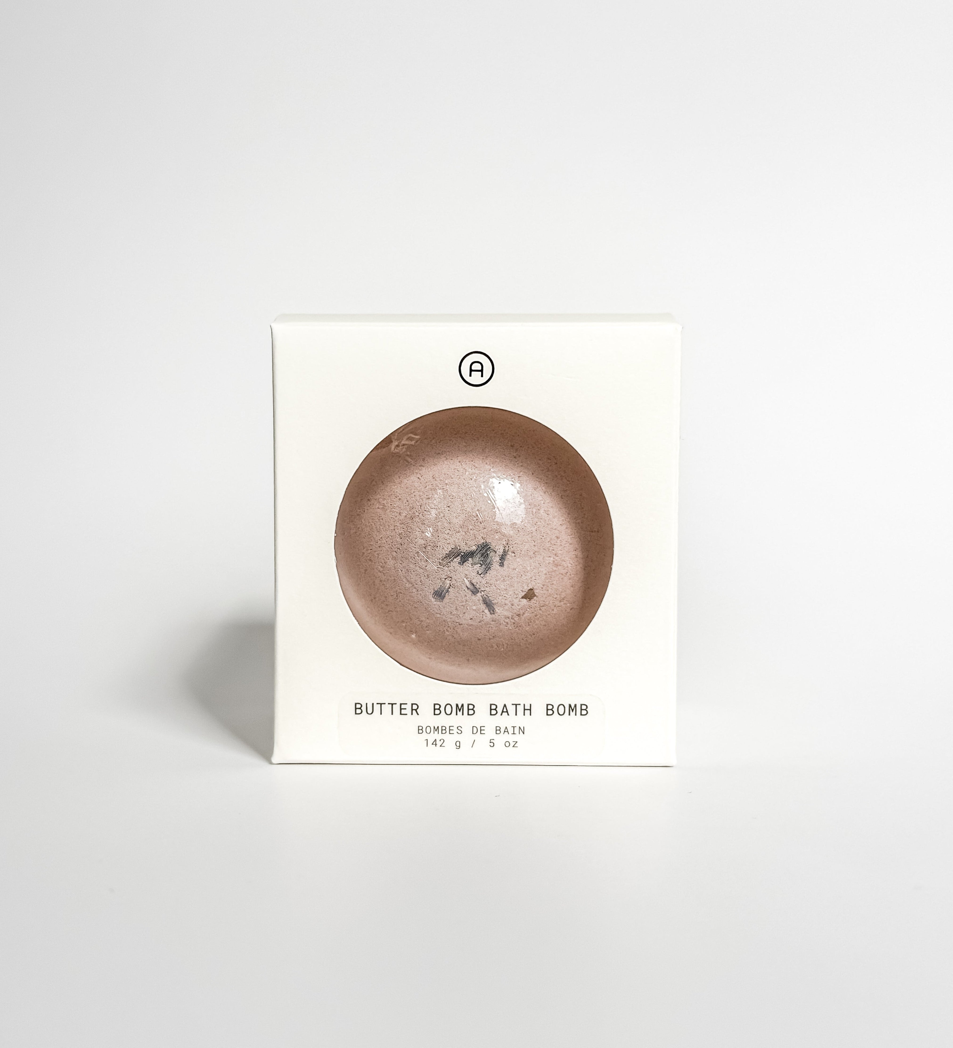 Aqua Studio Butter Bomb Bath Bomb packaging box, a self-care product featured in Muse Baskets and Co. gift baskets