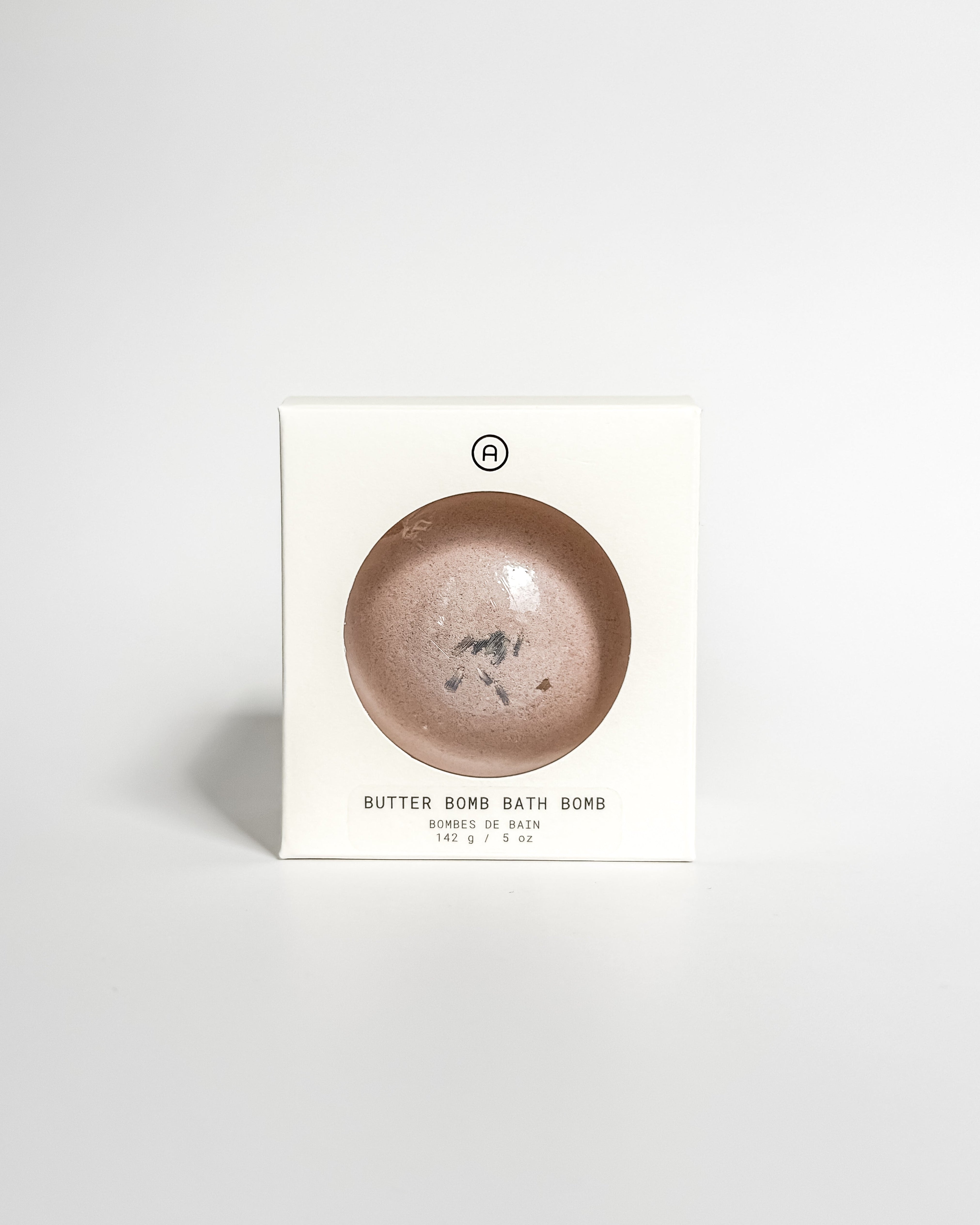 Aqua Studio Butter Bomb Bath Bomb packaging box, a self-care product featured in Muse Baskets and Co. gift baskets
