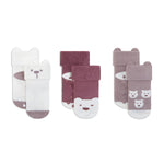 Set of baby socks with bear designs on a white background