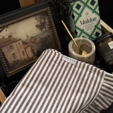 Hearth and Home new homeowner gift basket by Muse Baskets and Co., curated with kitchen and home pieces for realtor closing, possession day and client gifting.