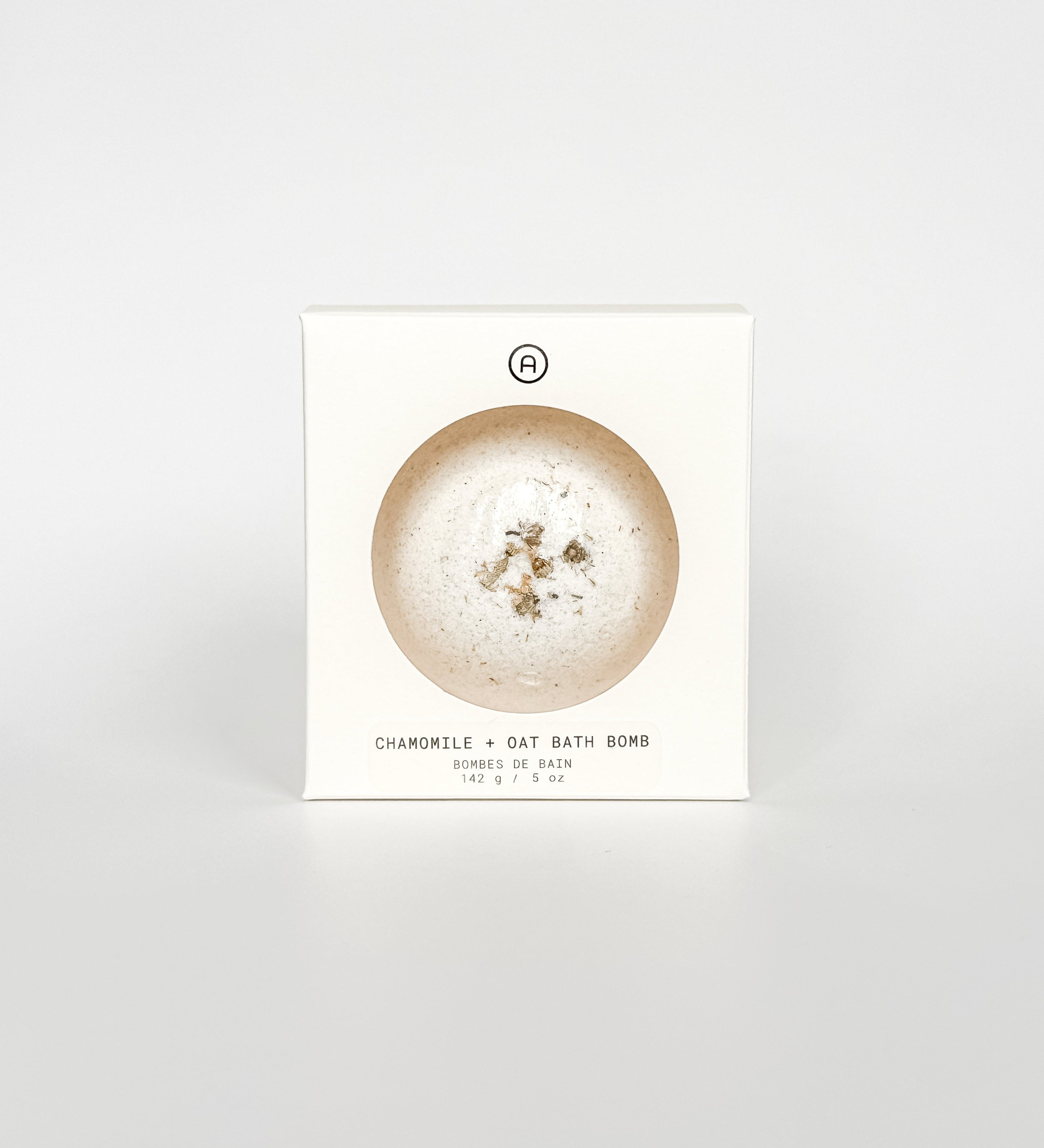 Chamomile and Oat Bath Bomb packaging box, a self-care product featured in Muse Baskets and Co. gift baskets