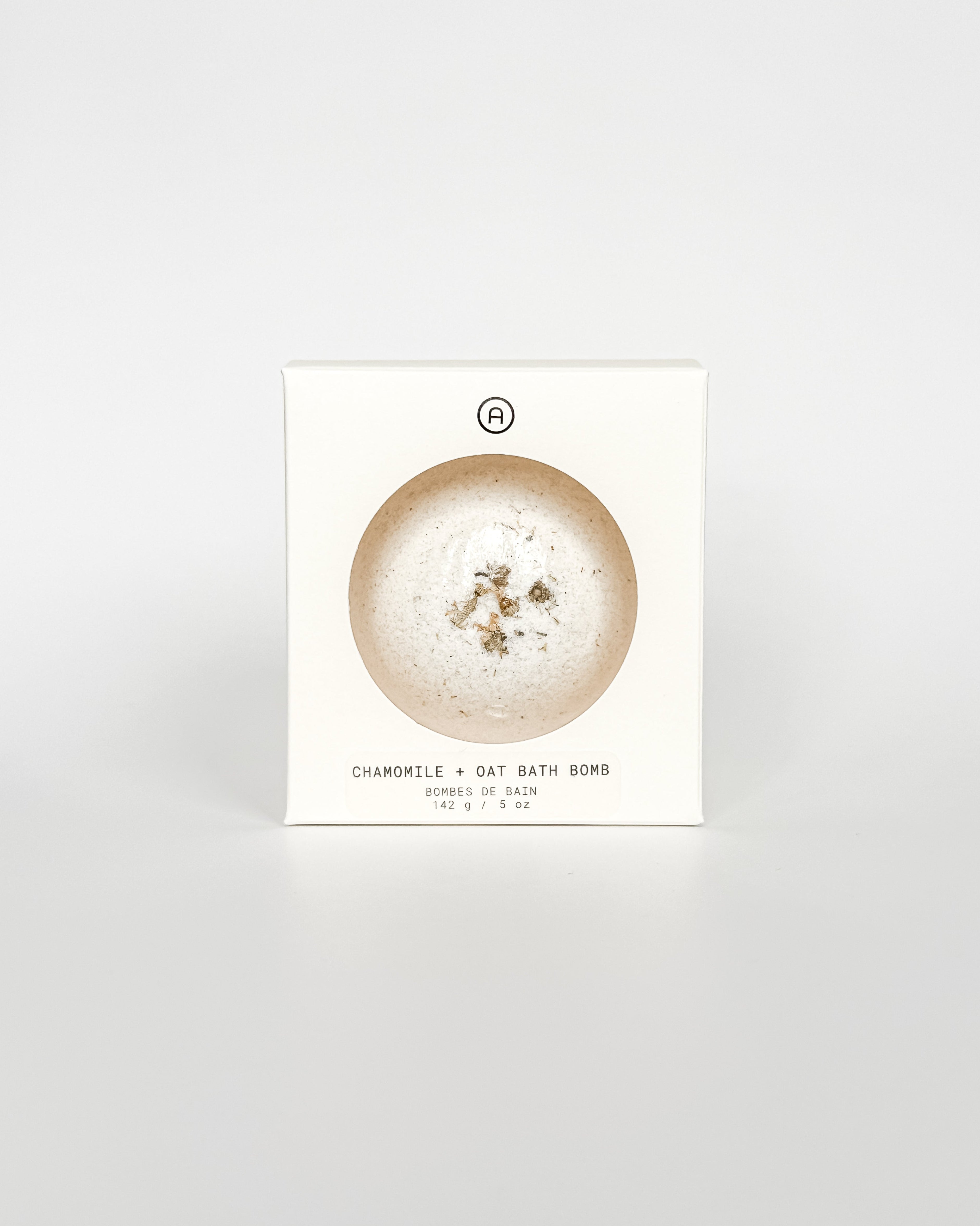 Chamomile and Oat Bath Bomb packaging box, a self-care product featured in Muse Baskets and Co. gift baskets