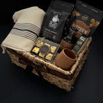Close up of Maison Café gift basket featuring handmade terracotta stoneware cup Nocturnal Espresso and Annie's Chocolates