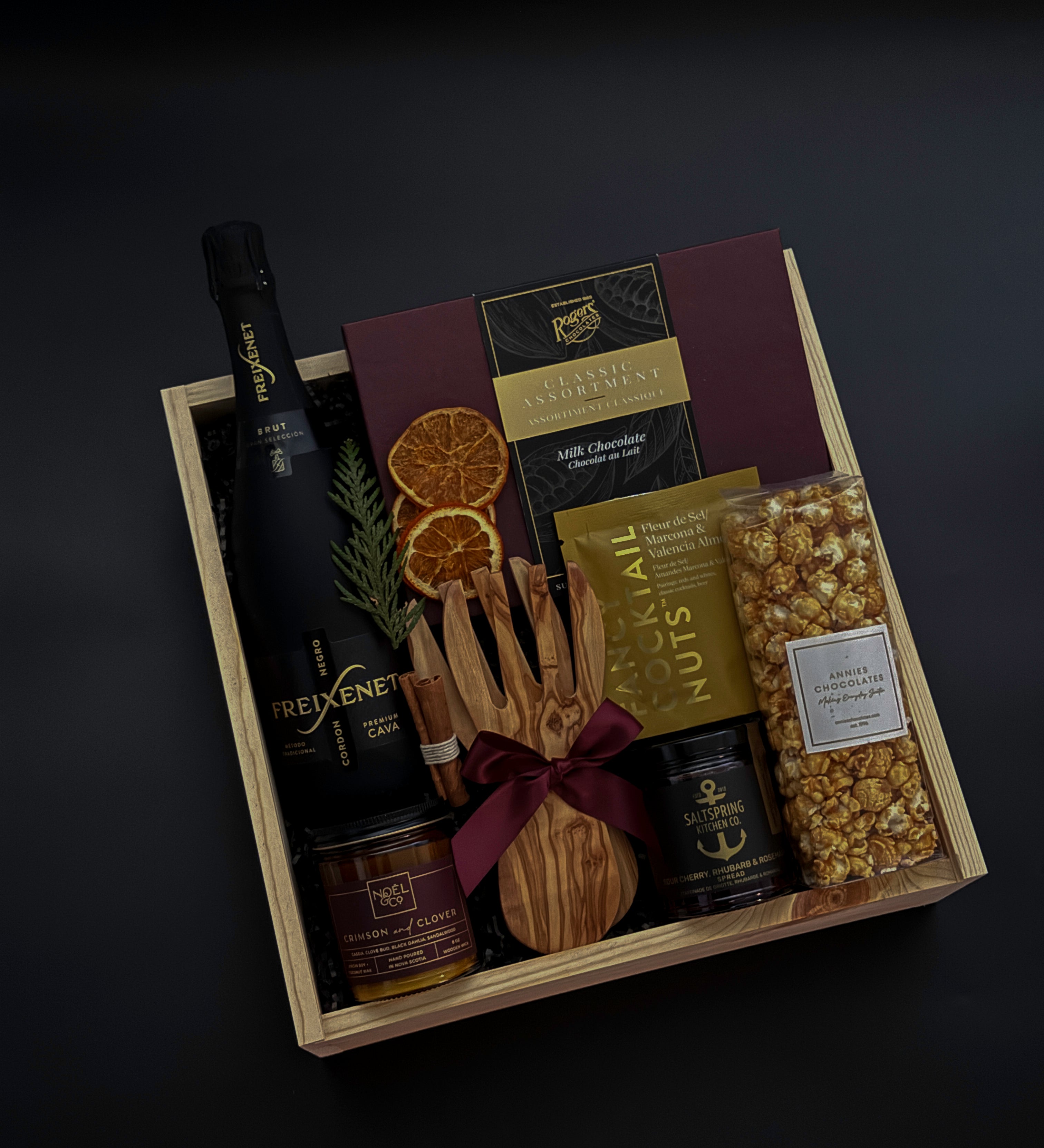 Noir Éclat holiday gift box with Freixenet cava, Canadian artisan treats, and keepsakes by Muse Baskets & Co