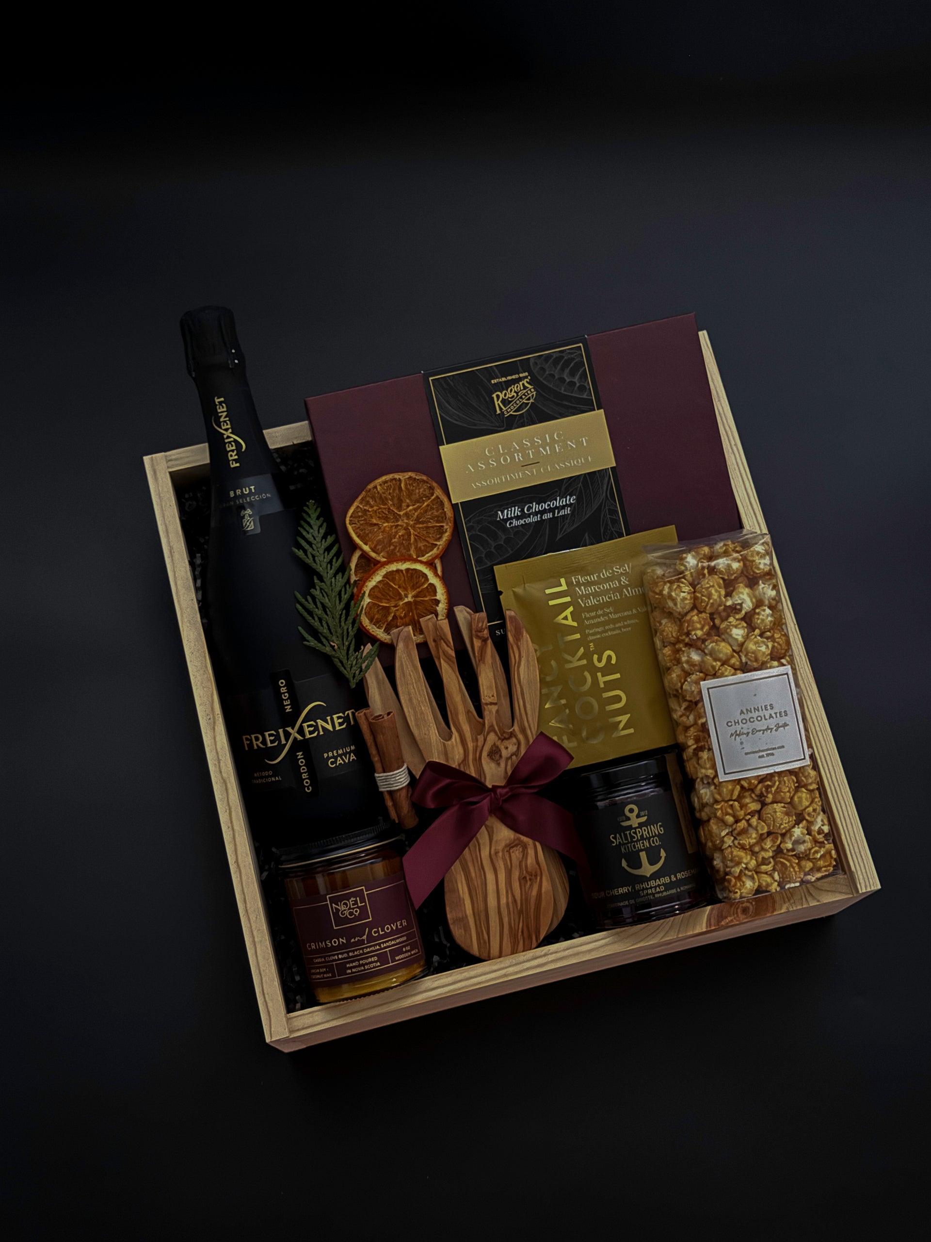 Noir Éclat holiday gift box with Freixenet cava, Canadian artisan treats, and keepsakes by Muse Baskets & Co