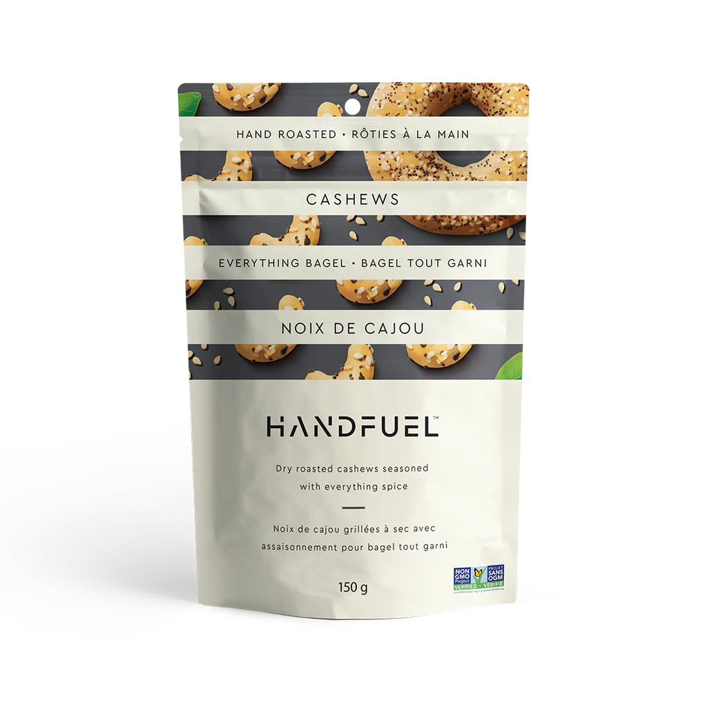 Handfuel cashew snack package with bagel seasoning on a white background