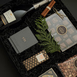 St. James Reserve holiday gift in a Signature Onyx box with satin ribbon, curated for VIP clients by Muse Baskets and Co.