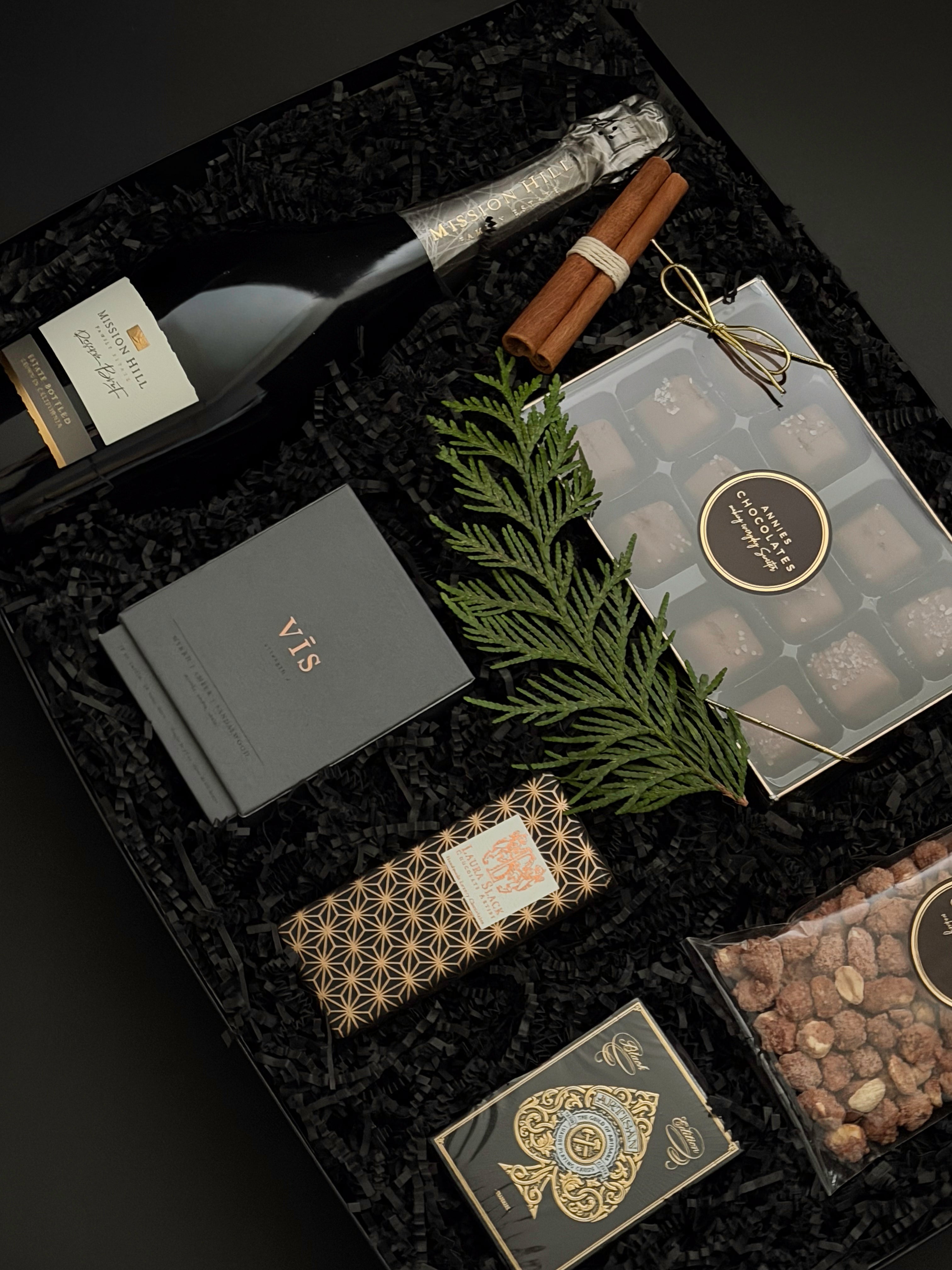 St. James Reserve holiday gift in a Signature Onyx box with satin ribbon, curated for VIP clients by Muse Baskets and Co.