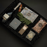 St. James Reserve by Muse Baskets and Co. featuring Annie’s salted caramels, roasted nuts and Theory 11 playing cards in an onyx gift box.