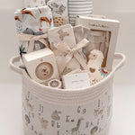 Our Little World gender-neutral baby gift basket with newborn essentials and Canadian-made products
