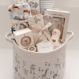 Our Little World gender-neutral baby gift basket with newborn essentials and Canadian-made products