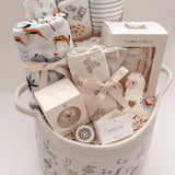 Luxury gender-neutral newborn gift basket with baby bath essentials, swaddle and keepsake basket