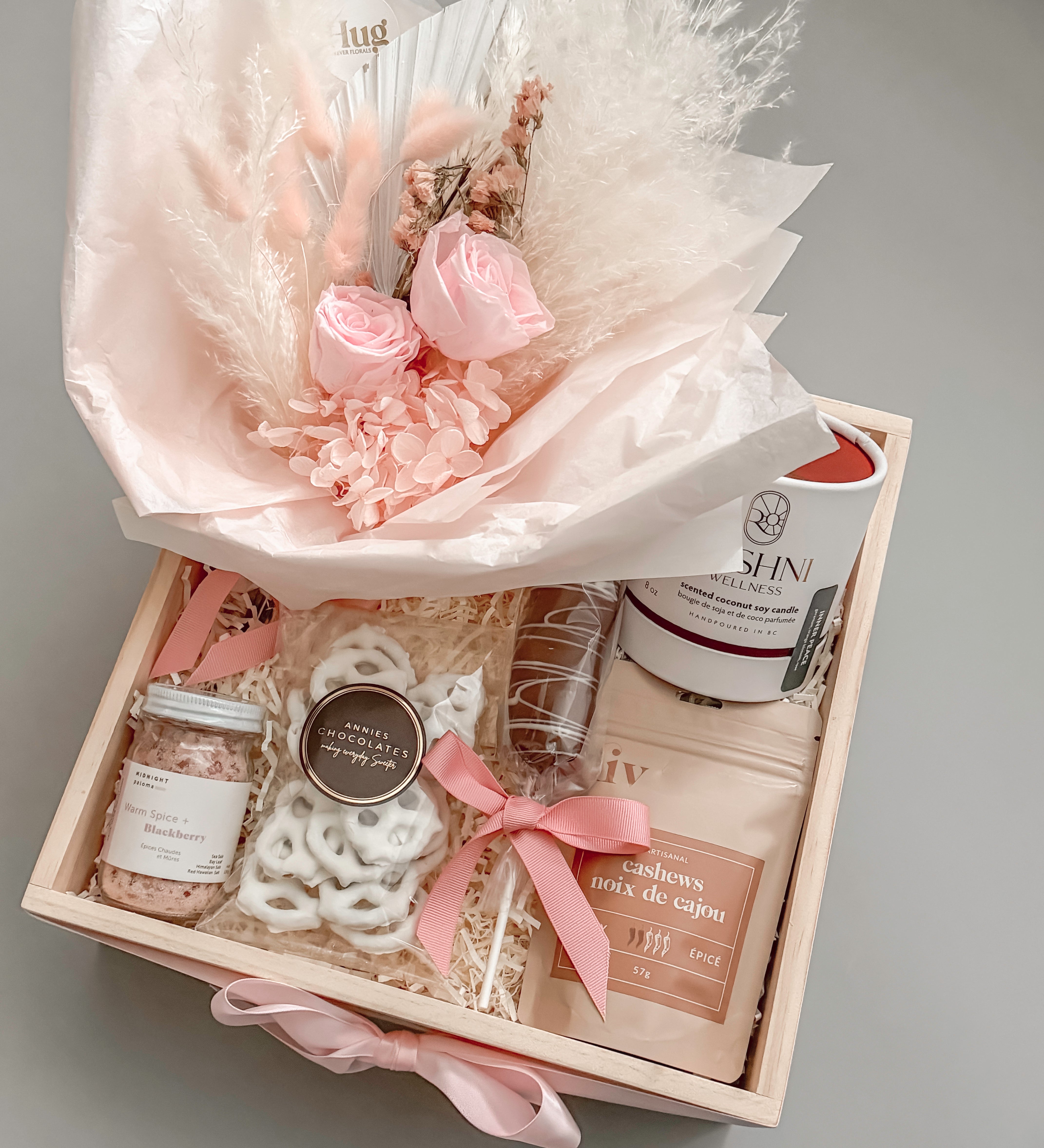
Gift basket for her with preserved florals white chocolate pretzels and Canadian artisan makers by Muse Baskets and Co Vancouver
