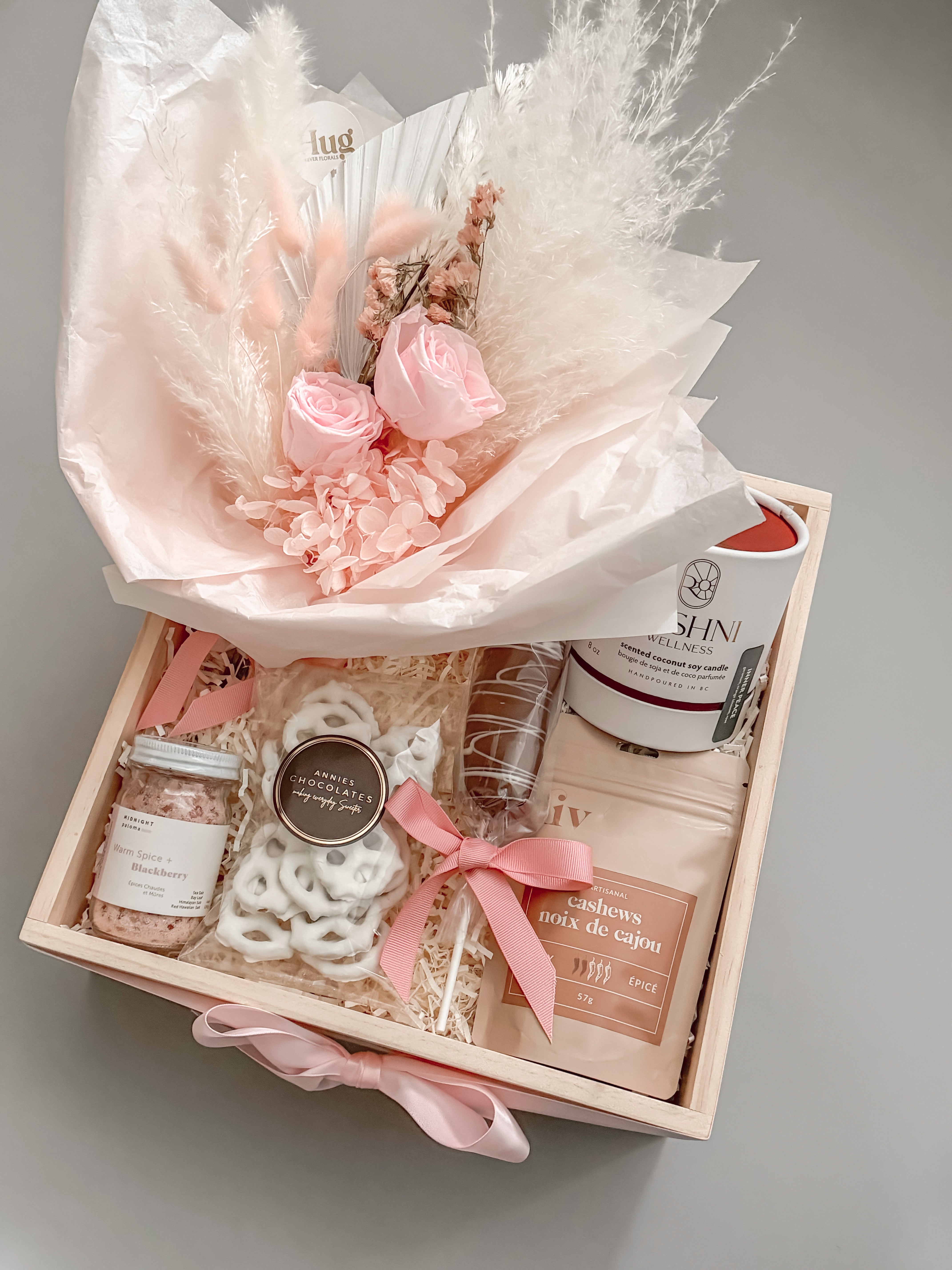 
Gift basket for her with preserved florals white chocolate pretzels and Canadian artisan makers by Muse Baskets and Co Vancouver
