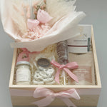 La Vie en Rose gift basket for her with Roshni Wellness candle Midnight Paloma bath salts and Liv Artisanal cashews in natural wood keepsake box