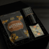 Dark tonal corporate gift box with Vancouver artisan products and premium packaging