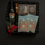 Holiday gift box with Baileys, artisan hot chocolate, and cookies.