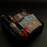 Corporate holiday gift with Baileys, shortbread cookies, and festive accents.