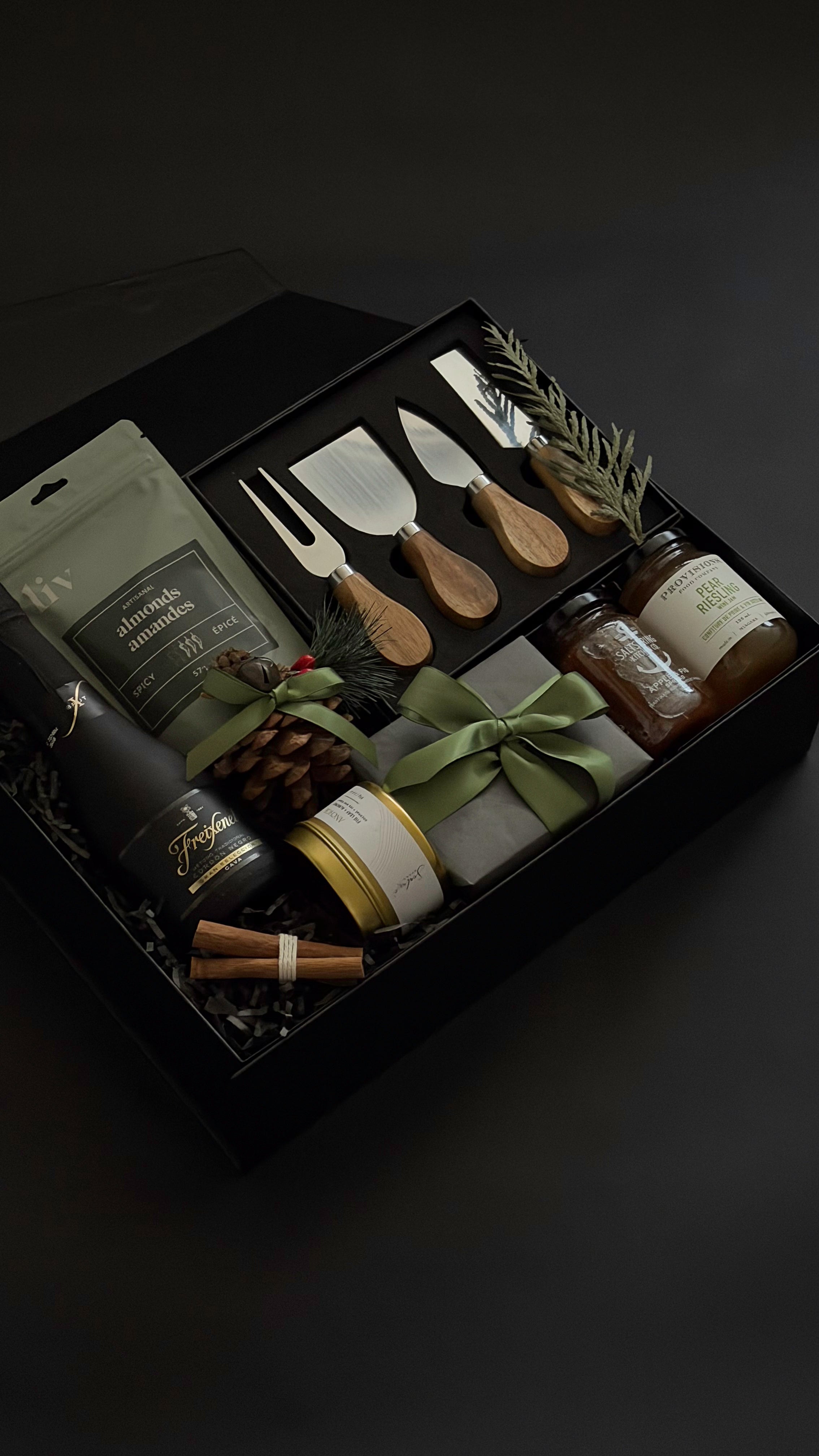 The Luxe Charcuterie Box with sparkling wine, artisan spreads, and cheese knives by Muse Baskets and Co.